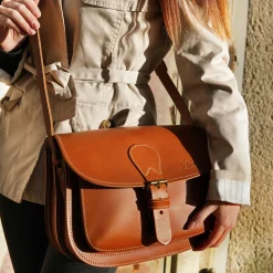 Hot Waschbär Lederhandtasche in Caramelbraun.